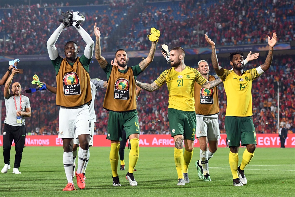 South African players celebrate after the African Cup of Nations, Last 16 match between Egypt and South Africa at Cairo International Stadium on July 06, 2019 in Cairo, Egypt. (Photo by Ahmed Hasan/Gallo Images)