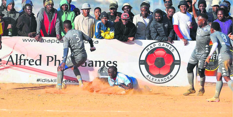 Mandla Masango (left) was among the fans who came to watch the Maimane Phiri Games at the Rotary Ground in Alexandra where Soweto Super United beat Elokshin for last-8 qualification. Photos byThemba Makofane