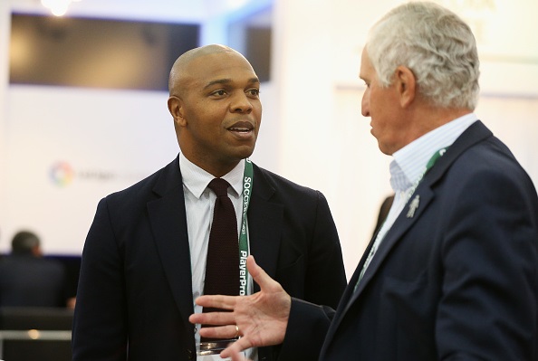 MANCHESTER, ENGLAND - SEPTEMBER 27: Former Manchester United footballer Quinton Fortune (L) talks to former England goalkeeper Ray Clemence during day 2 of the Soccerex Global Convention 2016 at Manchester Central Convention Complex on September 27, 2016 in Manchester, England.  (Photo by Barrington Coombs/Getty Images for Soccerex)