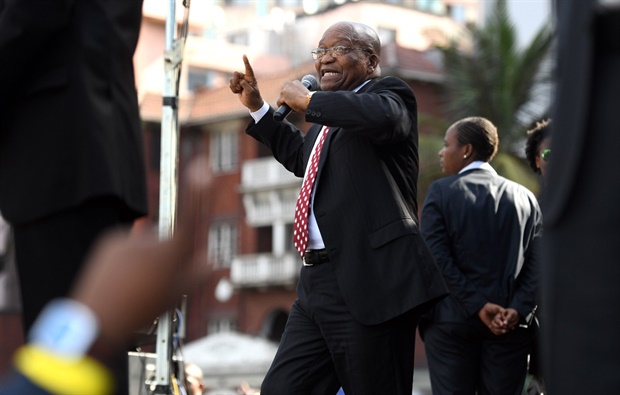 Former president Jacob Zuma dances on stage

