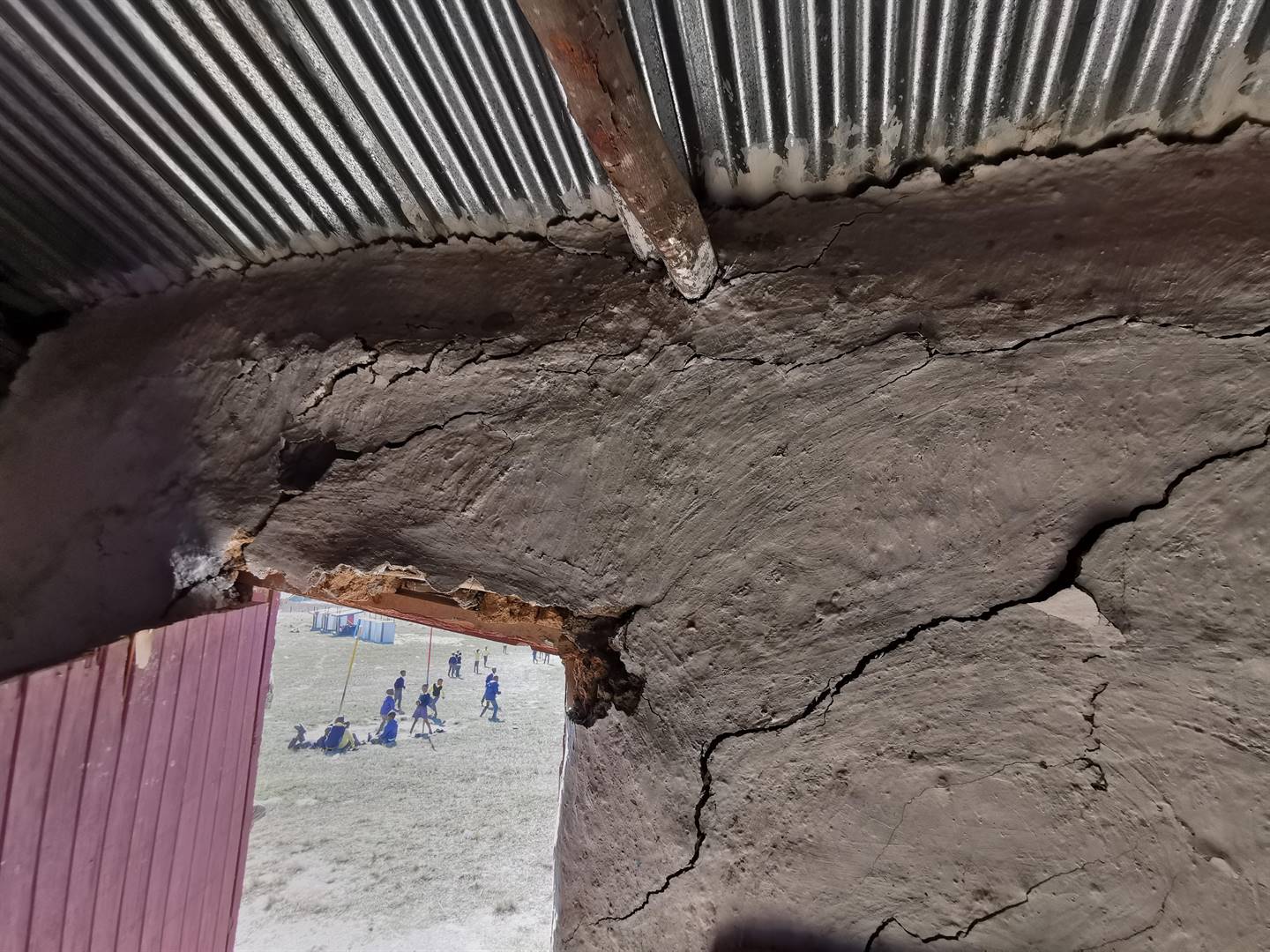 Cracks showing in the mud classrooms used by small learners at Lower Ntlaza Junior Primary School.  