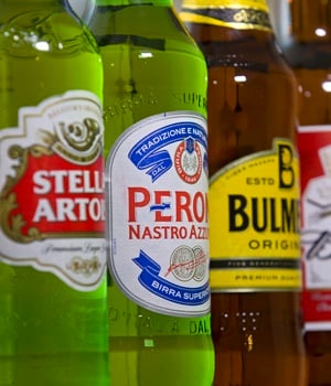 Bottles of beer and cider produced by Belgian-Brazilian group Anheuser-Busch InBev, and British-South African brewer SABMiller. (AFP)