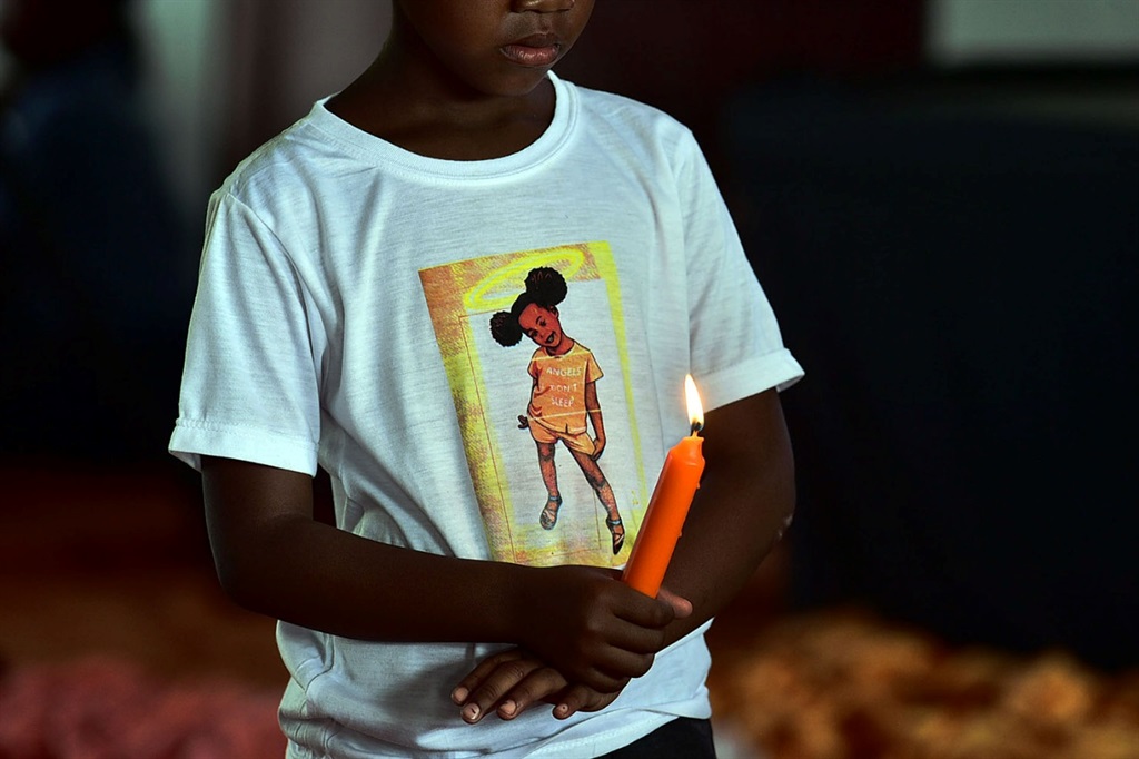 Residents of Wattville have gathered at a community center in Wattville to honor the life of the late Bokgabo Poo who's mutilated body was found on 11 of October.
Photo by Lucky Morajane