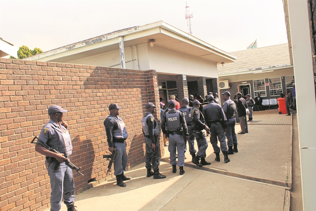 Heavily armed cops stood guard outside the Seshego Magistrates Court in Polokwane yesterday. Photo by Phuti Raletjena