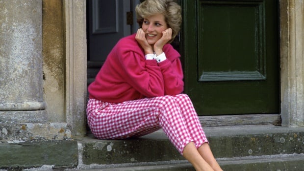 Diana, Princess Of Wales, sitting on the steps outside her country home, Highgrove