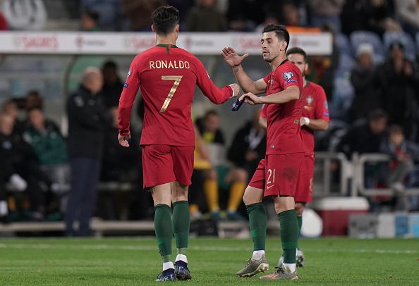  Pizzi of Portugal and SL Benfica congratulates Cristiano Ronaldo of Portugal and Juventus during the UEFA Euro 2020 Qualifier match between Portugal and Lithuania at Estadio Algarve on November 14, 2019 in Faro, Portugal.