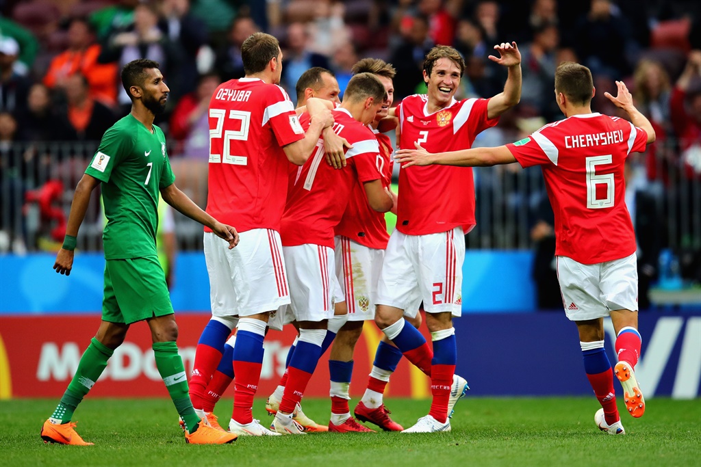 The Russia team celebrate their fifth goal during the 2018 FIFA World Cup Russia group A match between Russia and Saudi Arabia at Luzhniki Stadium on 14 June.