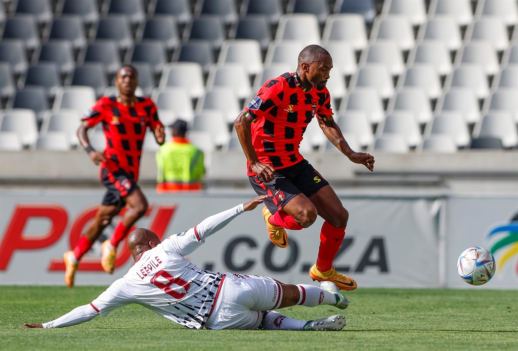 NELSPRUIT, SOUTH AFRICA - OCTOBER 30: Tlotlo Leepile of Sekhukhune United Football Club and Bernard Parker of TS Galaxy FC during the DStv Premiership match between TS Galaxy and Sekhukhune United at Mbombela Stadium on October 30, 2022 in Nelspruit, South Africa. (Photo by Dirk Kotze/Gallo Images)