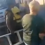 WATCH | Poles apart: Angry East London resident scuffles with ANC election poster crew