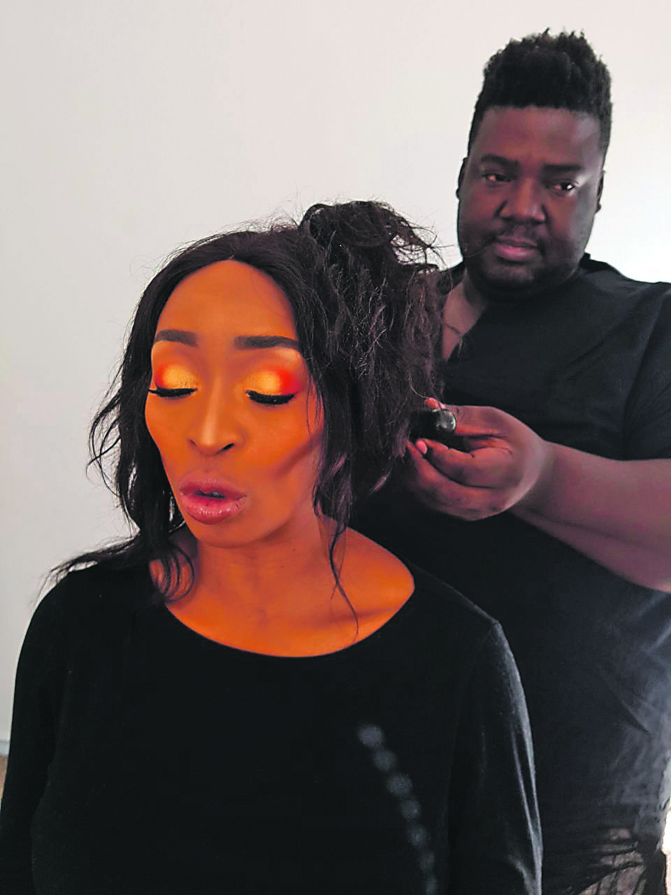 Kabelo Pusoe (right), who worked on presenter Khabonina Qubeka’s hair, claims he is owed R2 000.