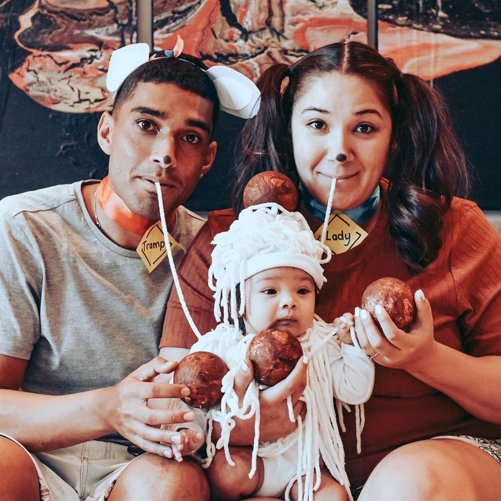 Travis and his wife Kaylin as the Lady and the Tramp of Halloween with their infant daughter in Spaghetti and Bolognaise costume.
