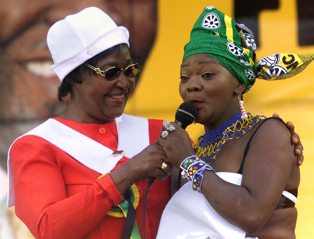 Winnie Madikizela-Mandela with Brenda Fassie greet