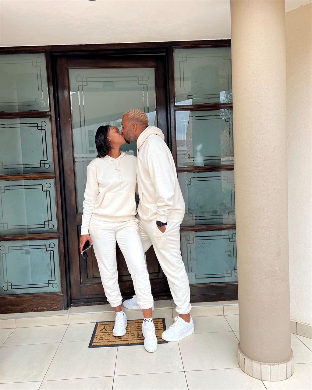 Itumeleng Khune matching outfits with his wife Sph