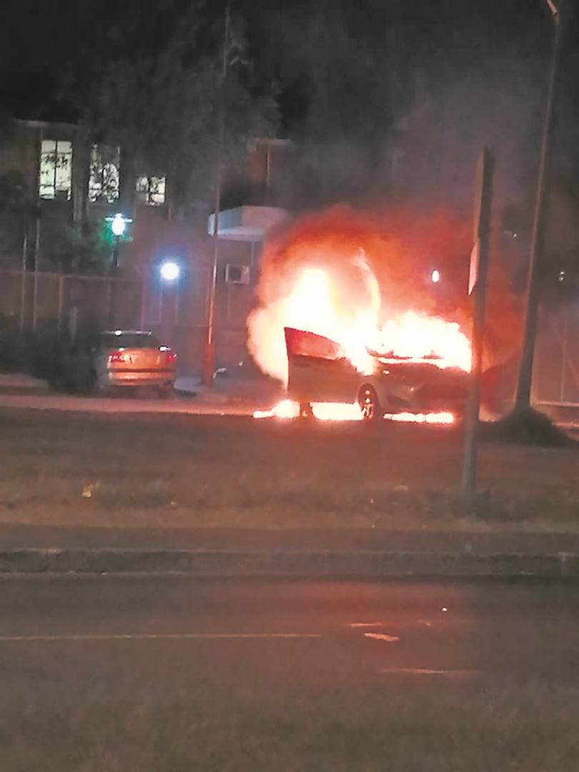 A vehicle was burnt outside a cop shop on Tuesday night. 