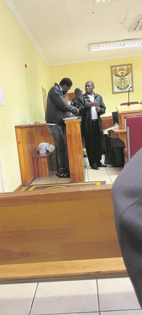 Kgomotso Mashego (right) listening attentively as judgment was being delivered in court, and Kenneth Malamule interpreting the magistrate’s verdict on Friday. 
