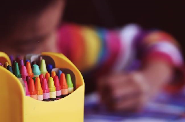 Colouring has much more benefits than just being a fun activity. Photo by Aaron Burden on Unsplash