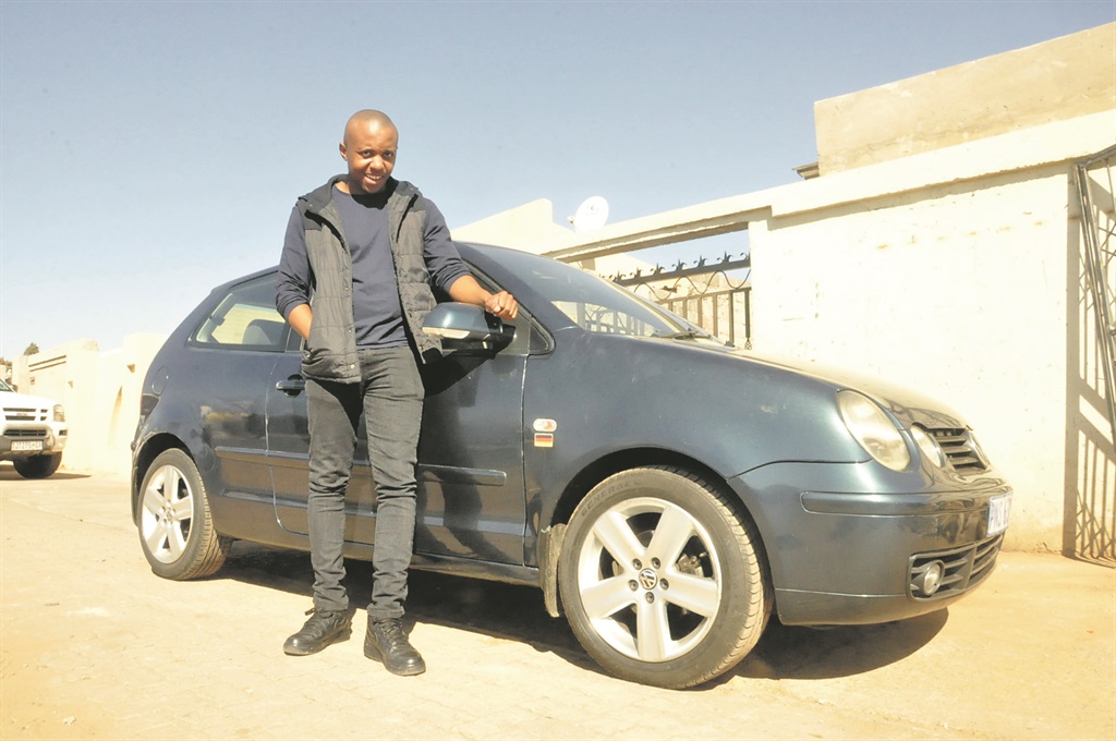 Kgomotso Maake next to his lovely wheels.           Photo By Thabo Monama
