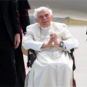 Pope Francis meets Benedict's top aide as memoir rattles Vatican
