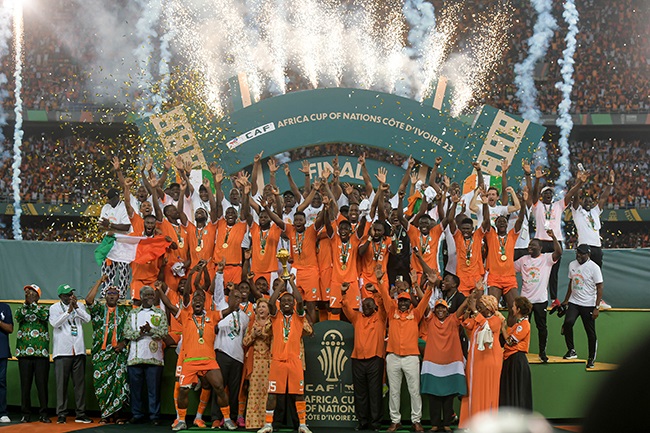 Ivory Coast players celebrate winning the Africa Cup of Nations at Stade Olympique Alassane in Abidjan on 11 February 2024. (Photo by Segun Ogunfeyitimi/Gallo Images)