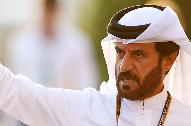 Mohammed Ben Sulayem waves to the crowd at a Grand Prix (Bryn Lennon/Getty Images)