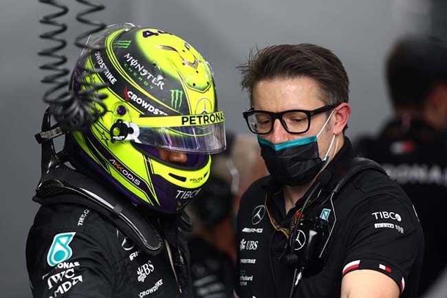 Lewis Hamilton of Great Britain and Mercedes and race engineer Peter Bonnington talk in the garage during practice ahead of the F1 Grand Prix of Saudi Arabia at the Jeddah Corniche Circuit on March 25, 2022 in Jeddah, Saudi Arabia. 