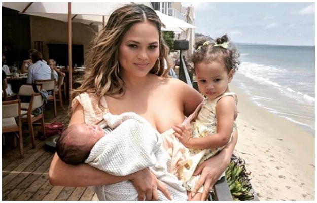 Chrissy Teigen with baby Miles and Luna. (Photo: Chrissy Teigen Instagram)