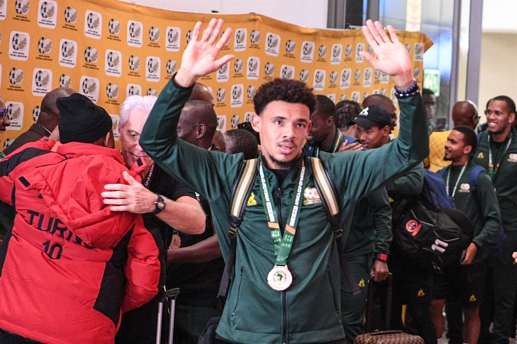 Bafana Bafana captain Ronwen Williams with teammates during the South African national football team arrival at OR Tambo Airport on February 14, 2024 in Johannesburg, South Africa. 