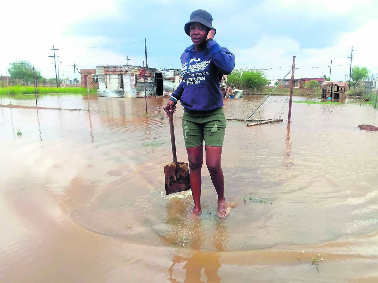 Mavis Mabunda said she and her family have been living in a flooded house for three days.     Photo by Raymond Morare