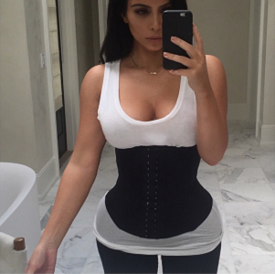 Kim Kardashian West takes a selfie in her waist trainer