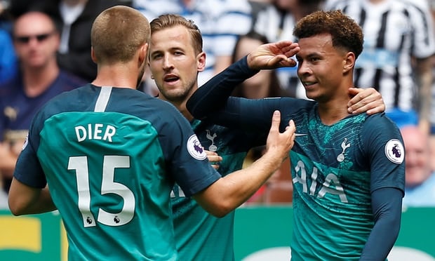 Dele Alli celebrates with Harry Kane and Eric Dier after nodding home Tottenham’s winner.