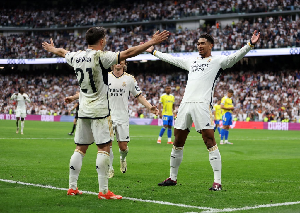 MADRID, SPAIN - MAY 04: Jude Bellingham of Real Madrid celebrates scoring his teams second goal with teammates Brahim Diaz and Luka Modric during the LaLiga EA Sports match between Real Madrid CF and Cadiz CF at Santiago BernabÃ©u Stadium on May 04, 2024 in Madrid, Spain. (Photo by Florencia Tan Jun/Getty Images)