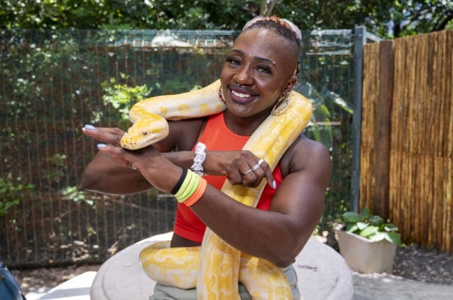 Mbali Mtshali is comfortable with snakes such as Banana the python, who is as meek as a lamb in her hands. (PHOTO: Darren Stewart)
