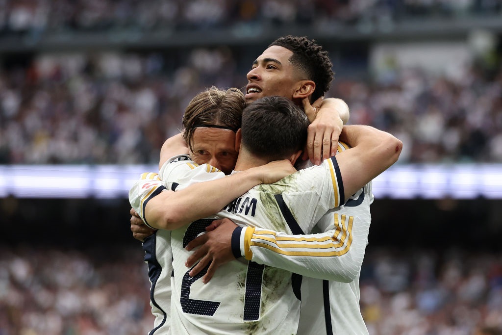 MADRID, SPAIN - MAY 04: Jude Bellingham of Real Madrid celebrates scoring his teams second goal with teammates Brahim Diaz and Luka Modric during the LaLiga EA Sports match between Real Madrid CF and Cadiz CF at Santiago BernabÃ©u Stadium on May 04, 2024 in Madrid, Spain. (Photo by Florencia Tan Jun/Getty Images)