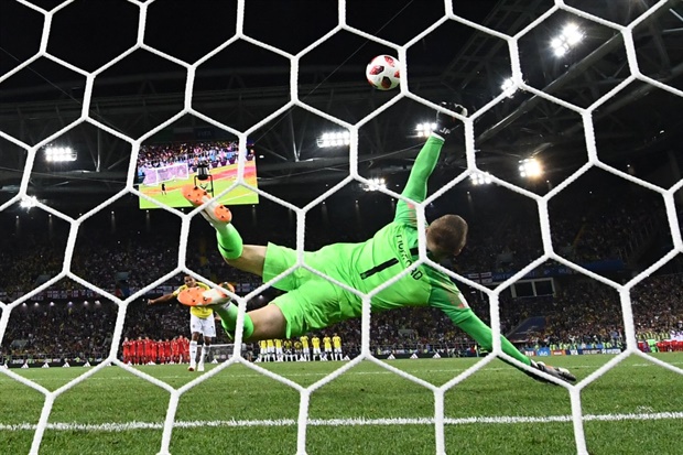 79' WONDERFUL counter move by Belgium that ends with a first time volley by Meunier that Pickford does well to save.<br />