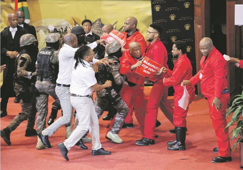 A confrontation that happened between members of the EFF and Parliament Security Services during the Sona 2023 in Cape Town. Photo by Reuters