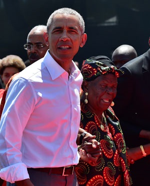 Former US president Barack Obama and his step-grandmother Sarah Obama (Picture: AFP)