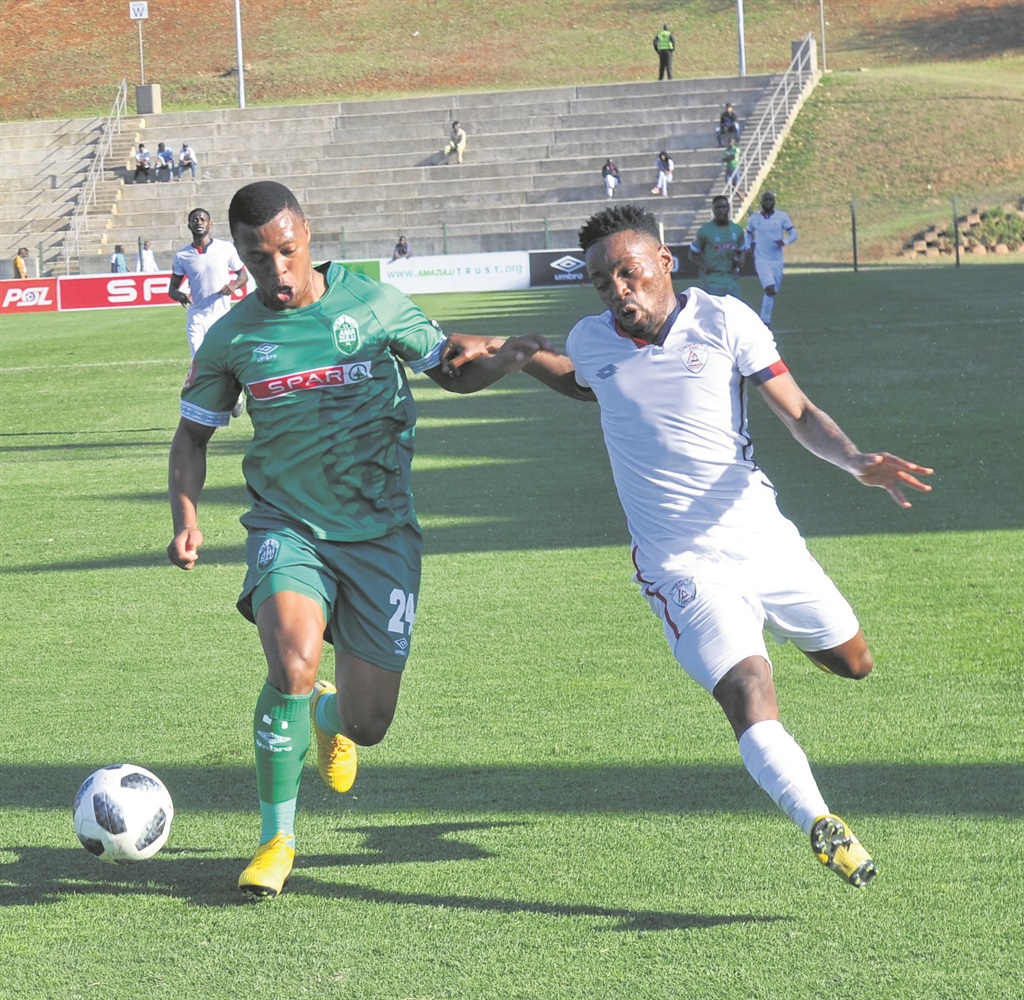 AmaZulu’s Thembela Sikhakhane (left) gets the better of Sinethemba Jantjie of Free State Stars at King Zwelithini Stadium yesterday. Photo byJabulani Langa 