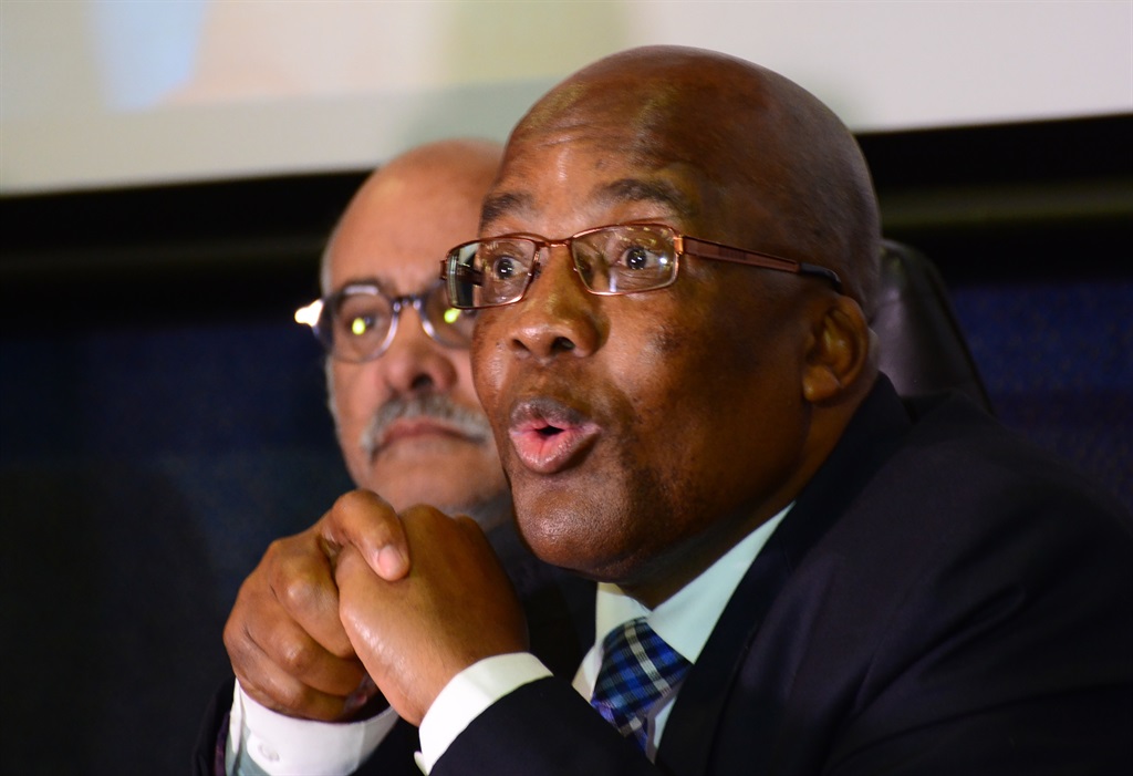 Professor Crain Soudien (chief executive of the Human Research Council) and Dr Aaron Motsoaledi (minister of health) during the fifth South African National HIV Prevalence, Incidence, Behaviour and Communication Survey briefing. Picture: Morapedi Mashashe