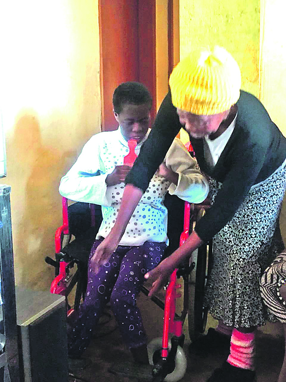 Gogo Martha Simelane is happy that her wheelchair-bound daughter Nondumiso is now able to move freely in their RDP house.