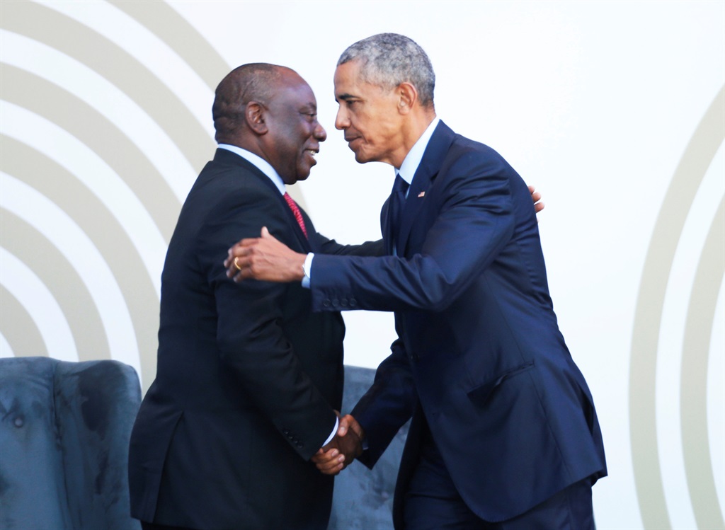 President Cyril Ramaphosa greets former US President Barack Obama. Picture: Siphiwe Sibeko/Reuters