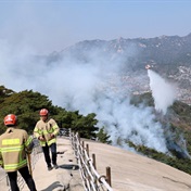 South Korean wildfire forces 500 residents to evacuate, rain helps fight flames