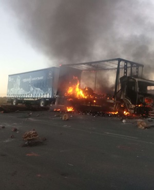 A truck burnt during protests on the R21. (Supplied) 