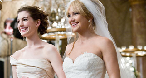 Anne Hathaway and Kate Hudson play competitive brides