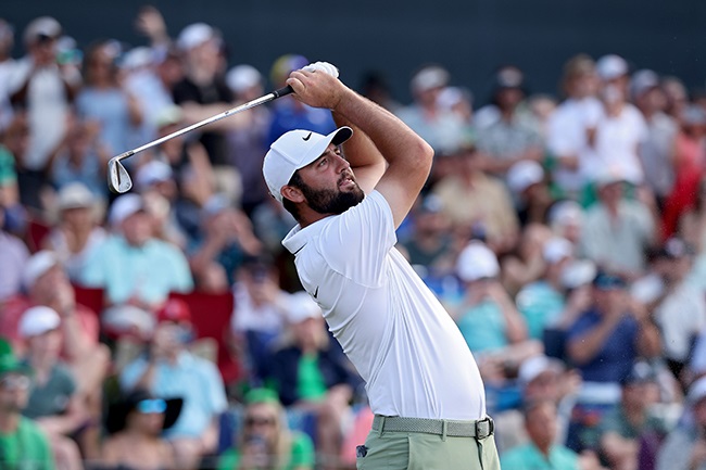 Scottie Scheffler plays his shot from the 17th tee during the final round of The Players Championship at TPC Sawgrass on 17 March 2024. (Photo by Jared C. Tilton/Getty Images)