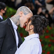 Kourtney Kardashian and Travis Barker kiss with tongues at events to avoid smudging her lipstick