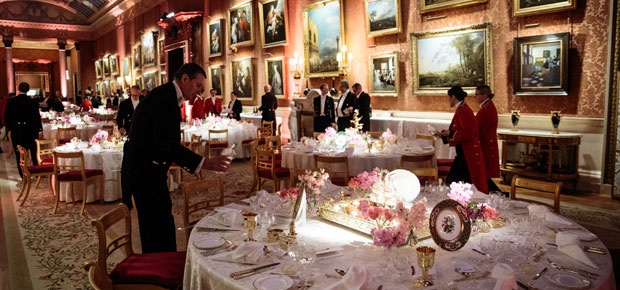 Palace staff prepare the tables ahead of a function at Buckingham Palace. (Photo: Getty Images)