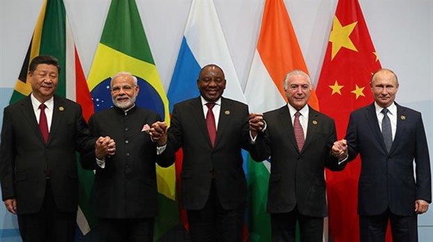 <em>The Brics leaders,&nbsp; from left China's President Xi Jinping, India's Prime Minister Narendra Modi, South Africa's President Cyril Ramaphosa, Brazil's President Michel Temer and Russia's President Vladimir Putin, pose for a group picture during the 10th Brics Summit held at the Sandton Convention Centre in Johannesburg. (Mike Hutchings, AFP)</em>