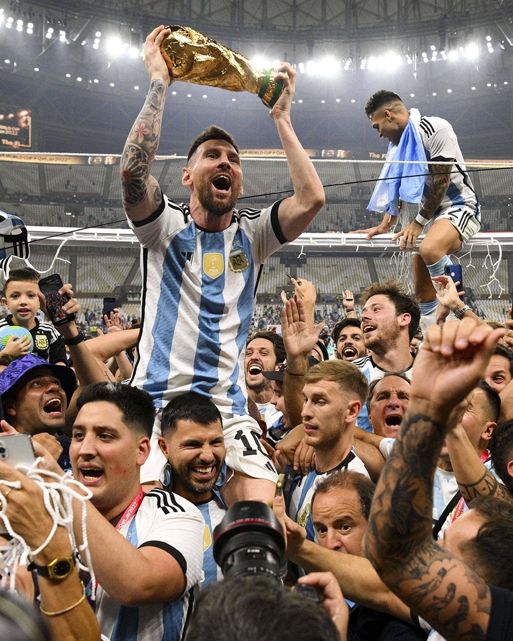 Argentina captain Lionel Messi lifting the World C