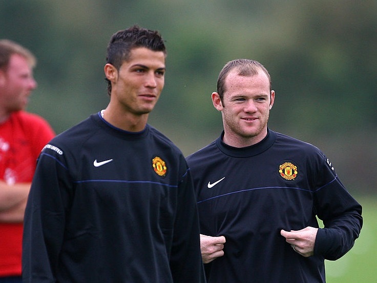 Cristiano Ronaldo (L) and Wayne Rooney (R)