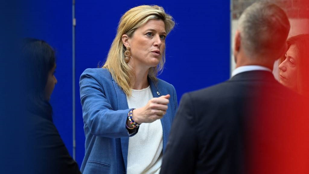 Belgium's Interior Minister Annelies Verlinden talks with attendees prior to a meeting with the representatives of six European countries to fight against cocaine trafficking, in Antwerp.
